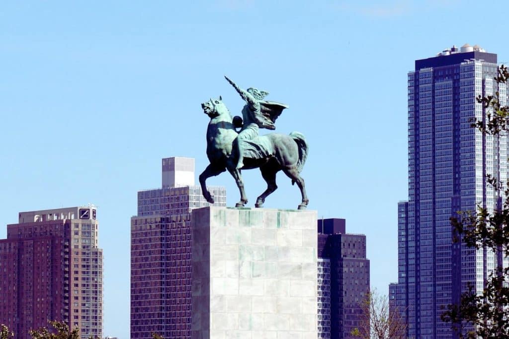A statue of a person riding a horse at the United Nations